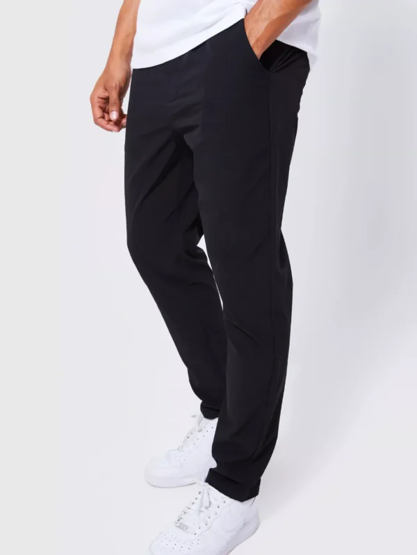 Pantalon slim technique léger à taille élastiquée